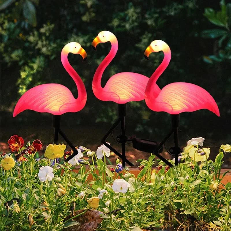 Aurinkoenergiaa käyttävä loistava flamingo Vaaleanpunainen – Taianomainen puutarha yöllä 